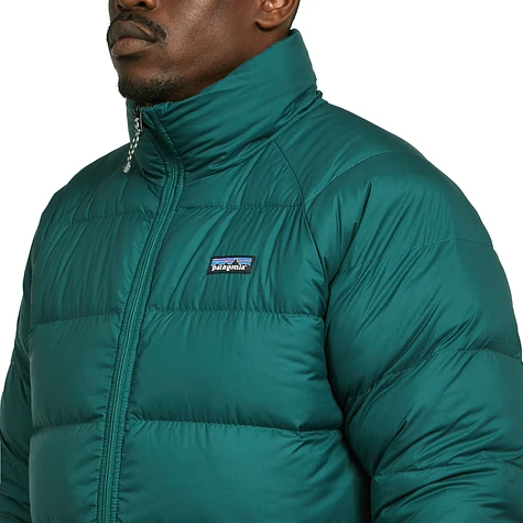 Patagonia REVERSIBLE SILENT - Down jacket - dunkelgrün/green 