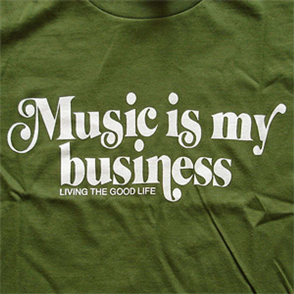Ubiquity - Music is my biz Women T-Shirt