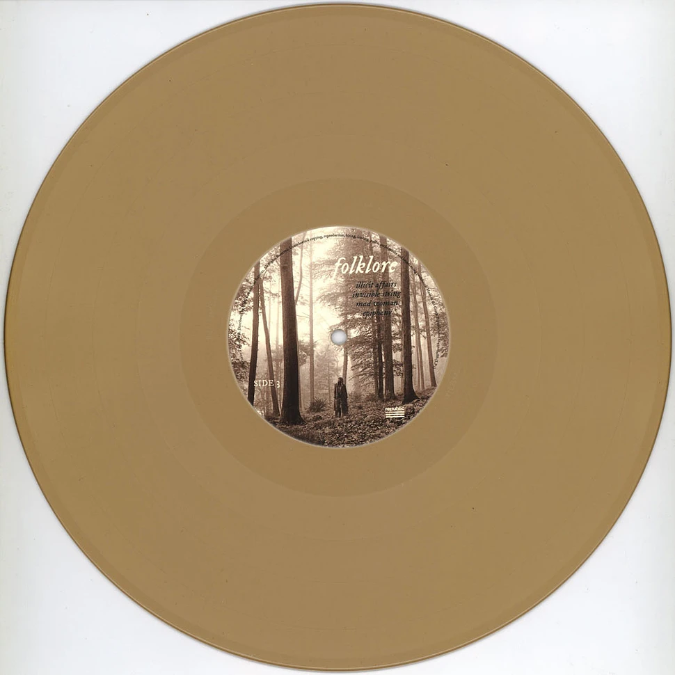 Folklore - Exclusive Limited Edition In The Trees Brown Colored 2x Vinyl  LP: CDs & Vinyl 