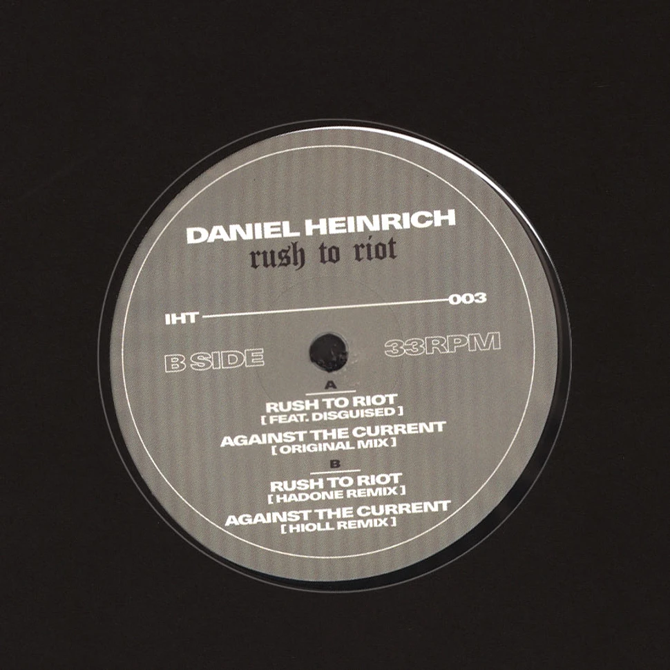 Daniel Heinrich - Rush To Riot