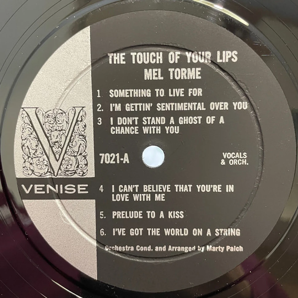 Mel Tormé - The Touch Of Your Lips